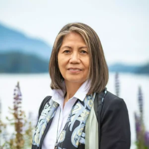 A headshot of Barbara Blake. She smiles for the camera.