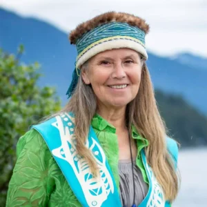 A headshot of Lisa Lang smiling for the camera.