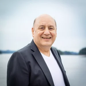 Michael Beasley smiles in a headshot photo.