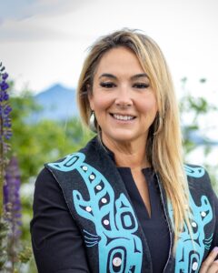 A headshot of Desiree Jackson smiling for the camera.