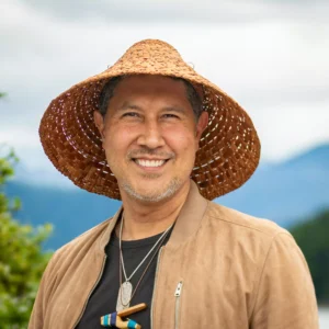 Monico Ortiz smiles in a headshot photo.